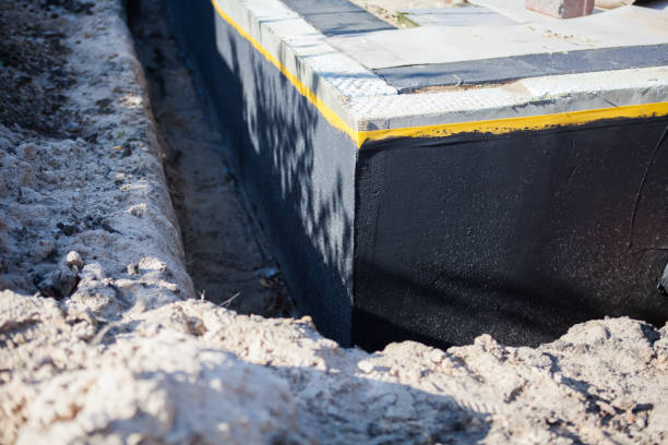 Professional Waterproofing technician working in Monroe, MI